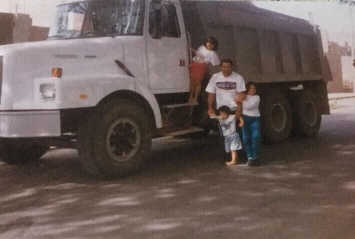 Mayra, of course, is the one hanging on the truck, with her father and siblings.