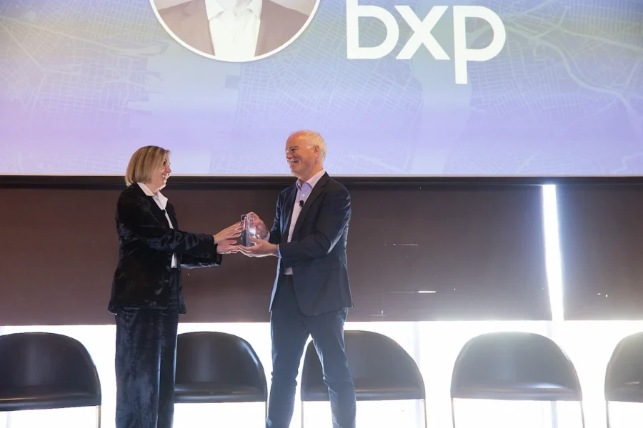 Building Ventures Partner Heather Widman presented BXP SVP and CTO Jim Whalen with the 2024 Building Ventures Innovator Award.