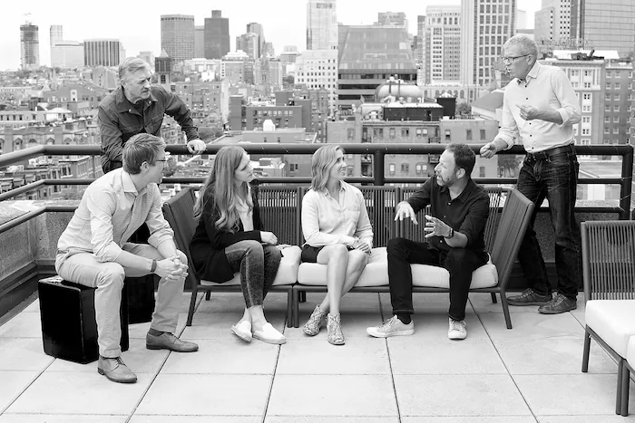 Building Ventures team photo on roof overlooking Boston